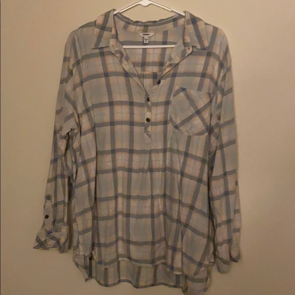 Quarter button down ladies top.